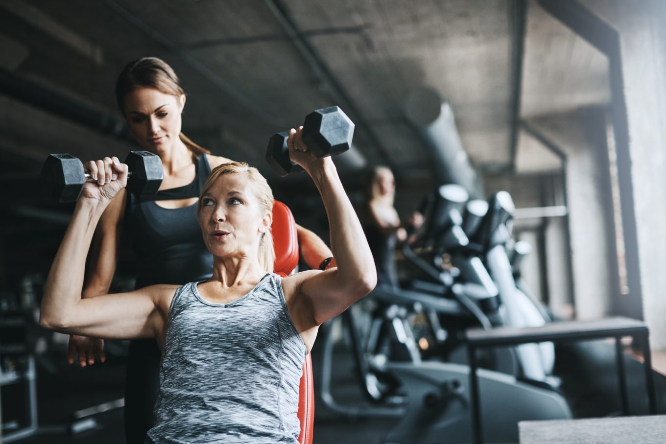 An athletic woman undergoing Vo2 Max Testing with accompanying vital metrics